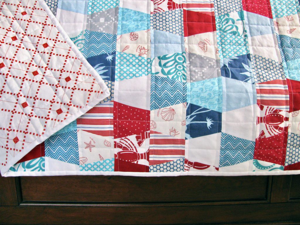 Red, white, and blue tumbler quilt