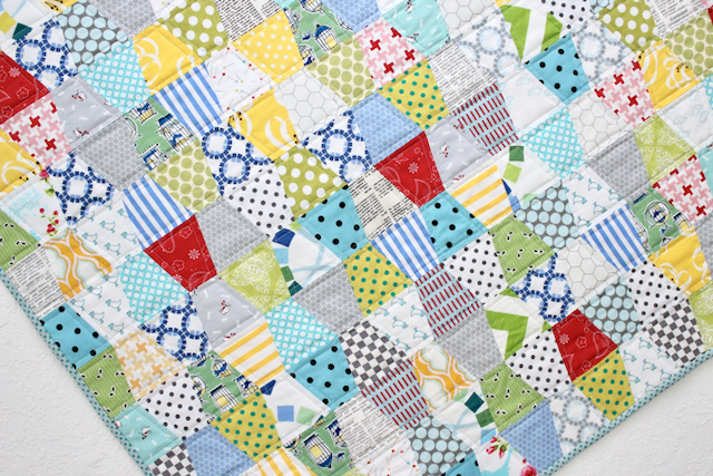 Scrappy AccuQuilt Tumbler Quilt